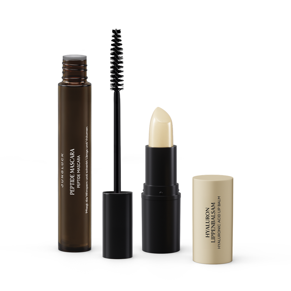 Beauty Essentials Transparenz Set mit Braunglas-Mascara und zwei schwarzen Lippenpflegeprodukten im eleganten Design.