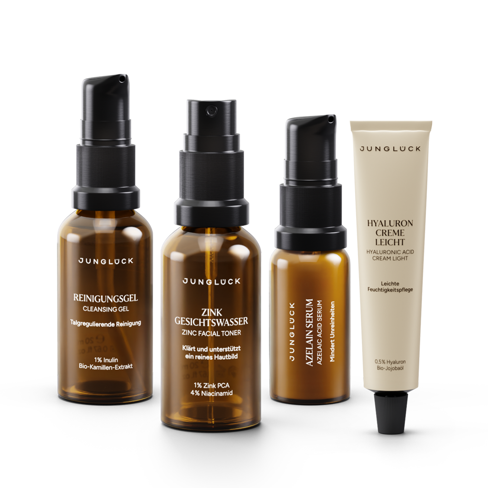 JUNGLÜCK Bye Bye Breakouts Kennenlern Set mit vier Braunglasflaschen: Reinigungsgel, Zink Gesichtswasser, Azaleenserum und