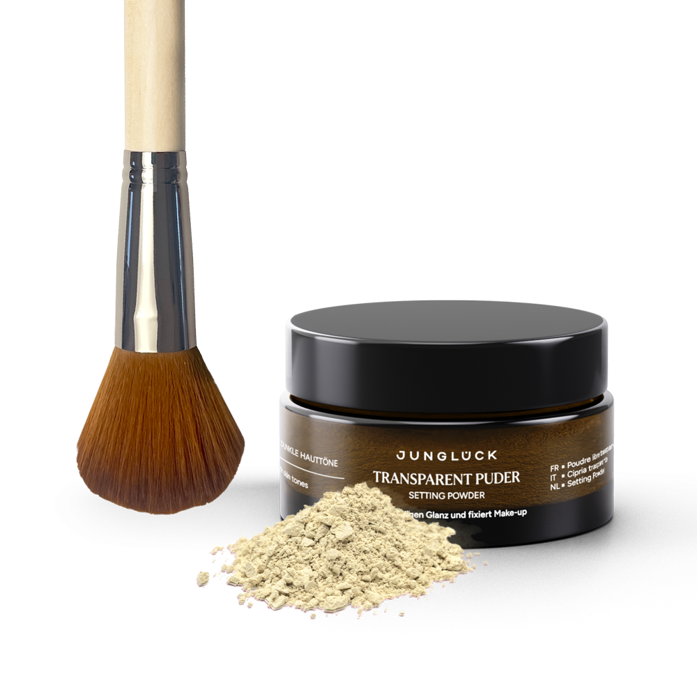 Braunglasbehälter mit transparentem Puder, daneben ein Puderpinsel mit weichen Borsten. Ideal für das Setting von Make-up.